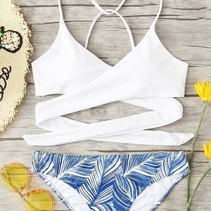 White wrap bikini with print bottoms size M
